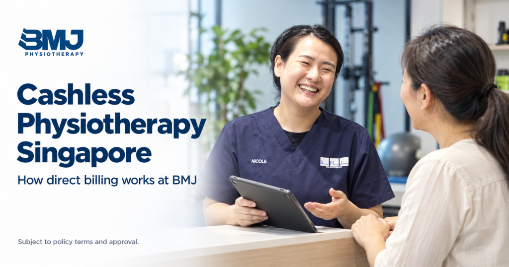 BMJ physiotherapist in navy scrubs discussing cashless physiotherapy with a patient in Singapore.